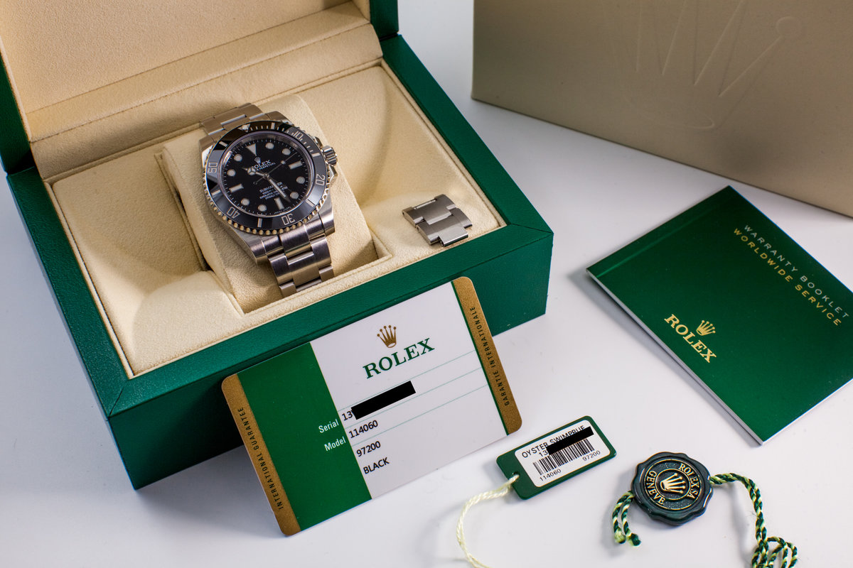 rolex submariner box and papers