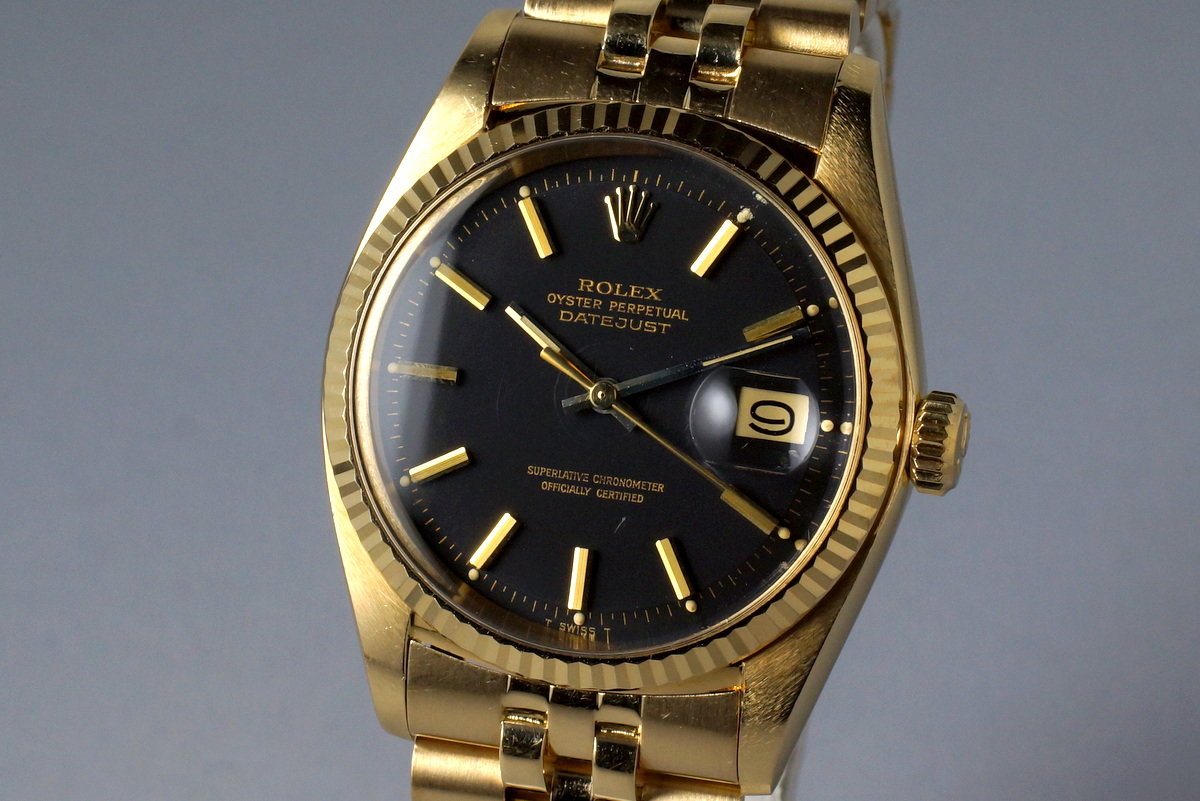 gold datejust black face