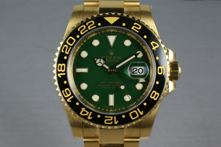 Rolex Ceramic GMT 18K GREEN Dial 116718 with box and papers photo